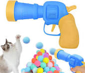 PISTOLA CON POMPONES PER-ROS
